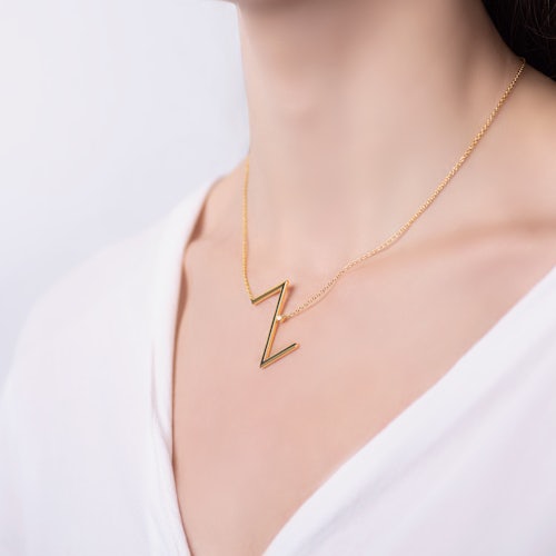 Naszyjnik celebrytka litera Z Savicki: srebrny pozłacany, biały szafir